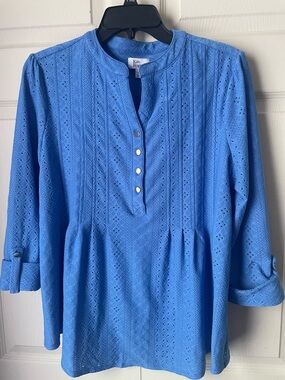 Eyelet top in a pretty blue.